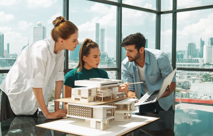 architect-team-discussion-about-design-while-worker-present-idea-tracery