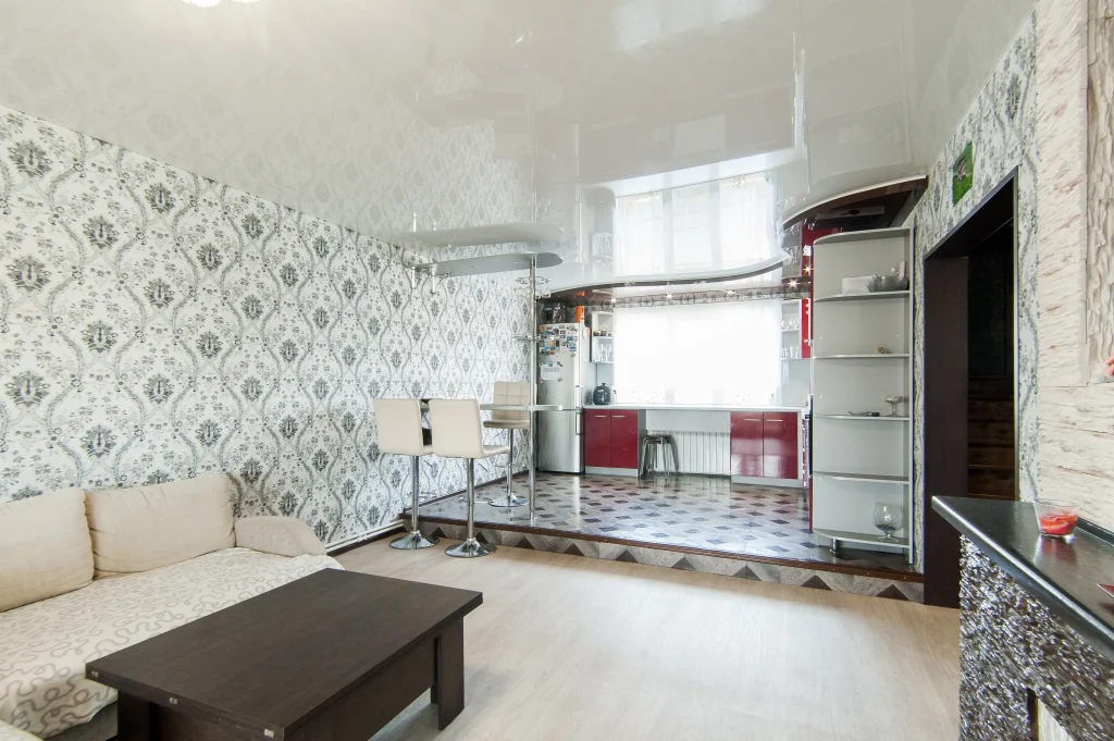 empty chairs table against wall building